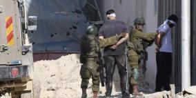 الاحتلال يعتقل 19 مواطنا من الخليل ويشدد من اجراءاته العسكرية لكافة القرى والبلدات