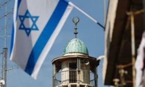 مستوطنون يرفعون أعلام دولة الاحتلال في بيت ساحور شرق بيت لحم