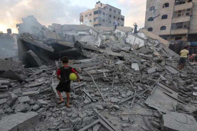 تدمير مبنى في غزة بفعل القصف الاسرائيلي- ارشيف