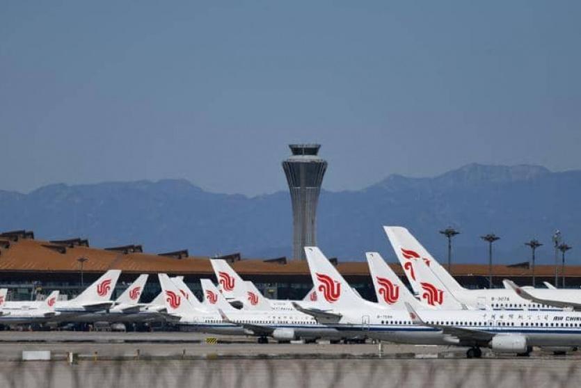 إصابات بكورونا تربك مئات الرحلات الجوية في الصين