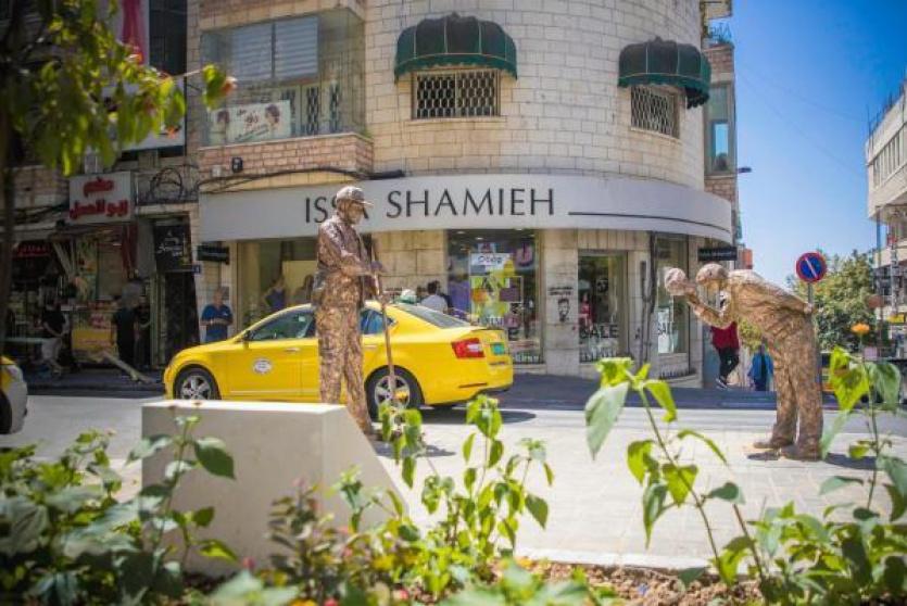 مجسم صانعو الجمال في مدينة رام الله