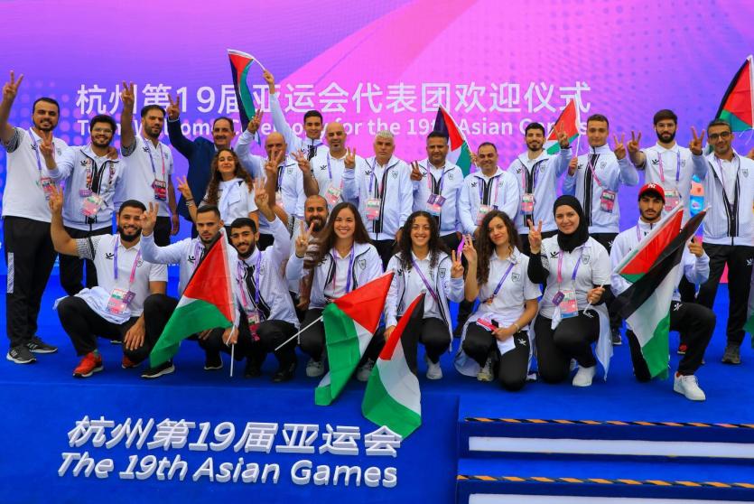 رفع علم فلسطين في قرية الرياضيين بدورة الألعاب الآسيوية