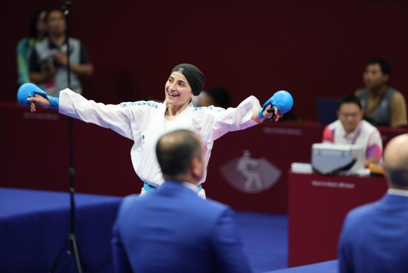 حلا القاضي تمنح فلسطين ميدالية تاريخية في الأسياد