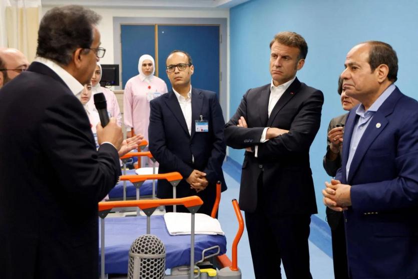 الرئيسان المصري والفرنسي يعودان جرحى العدوان الإسرائيلي على غزة في العريش